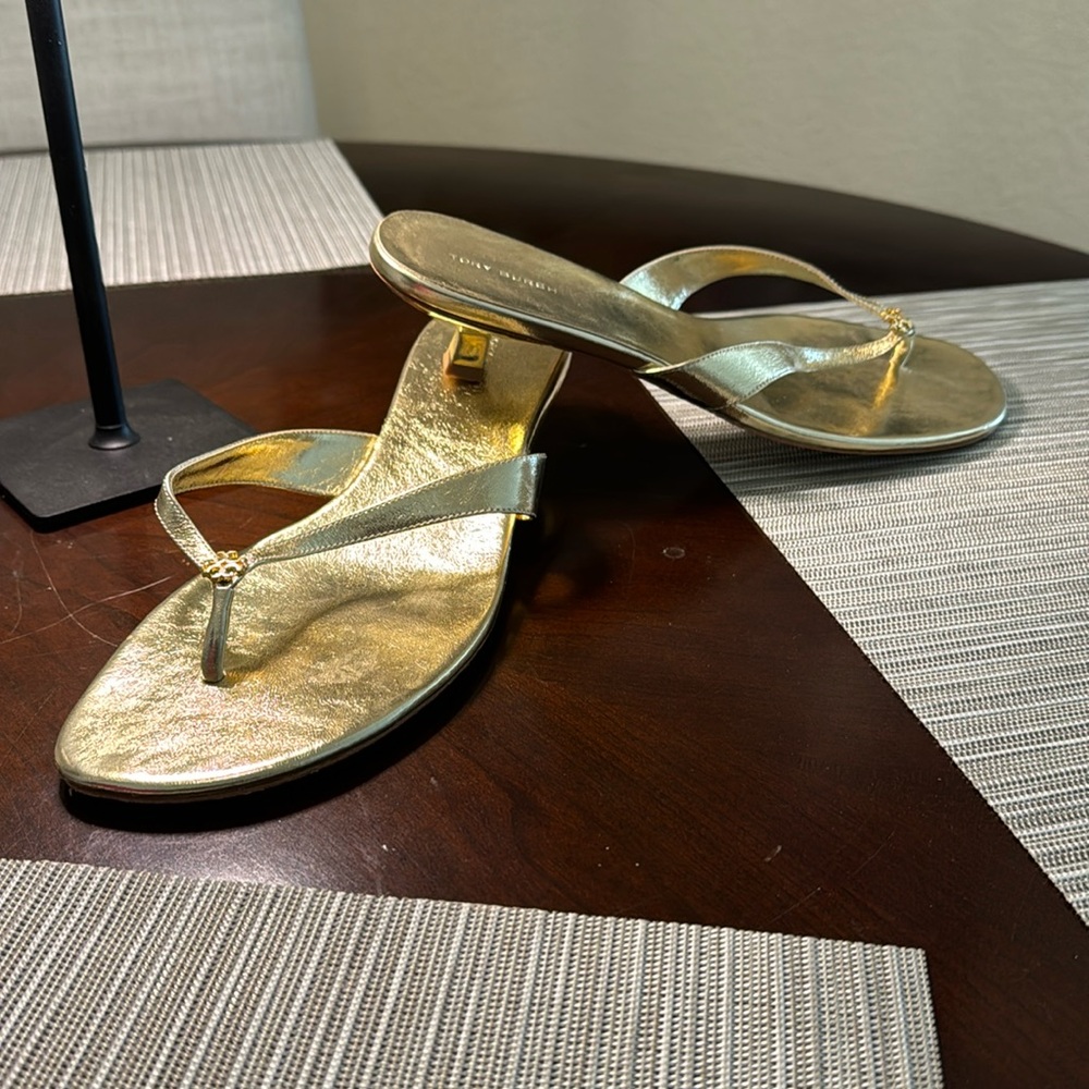 Tory Burch Gold Metallic sandals with kitten heel.